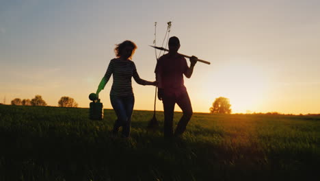 Steadicam-Shot:-Farmers---A-Man-And-A-Woman-Walking-Across-The-Field-At-Sunset-4