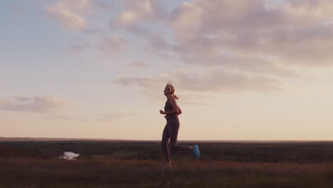 Athletic-Middle-Aged-Woman-Runs-At-Sunset-2