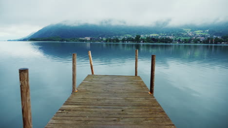 Wooden-Pier-On-A-Picturesque-Mountain-Lake-In-The-Alps-In-Austria