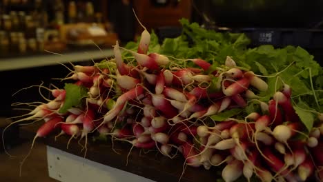 A-pile-of-radishes-sit-on-a-table