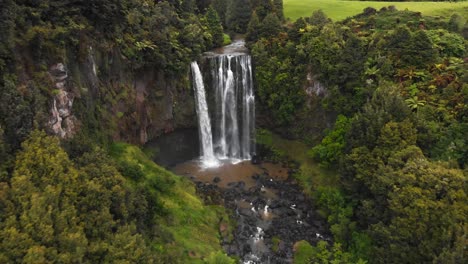A-remote-unknown-waterfall-with-colorful-valleys-and-colorful-lakes-in-New-Zealand