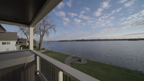 outdoor-deck-with-a-hot-tub-overlooking-a-lake-in-Minnesota