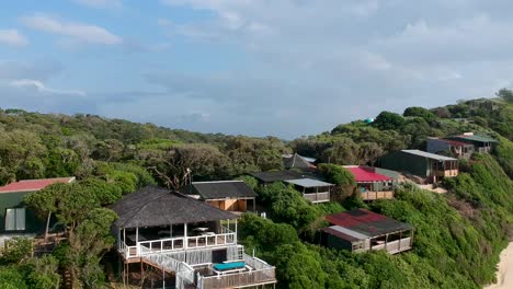 Aerial-view-of-beautiful-beach-house,-drone-punch-in-shot