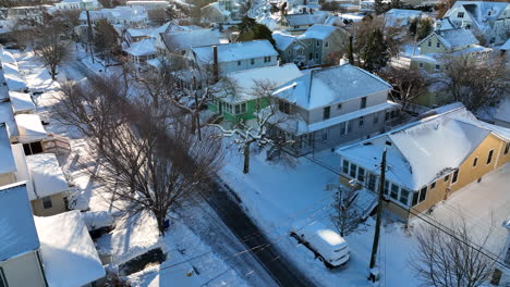 Aerial-of-American-homes-in-fresh-winter-snow