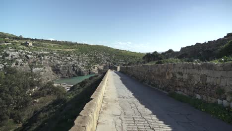 Road-Leading-To-Magrr-Ix-Xini-Bay-Beach-into-Mountains-Near-Canyon-in-Gozo-Island