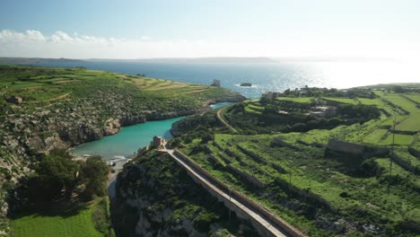 AERIAL:-Road-Leading-to-Magrr-Ix-Xini-Bay-in-Mediterranean-Sea