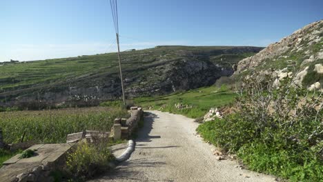 Walking-in-Gozo-Island-Outskirts-Valley-on-Sunny-Day