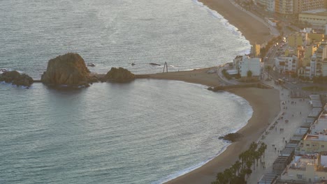Blanes-city-on-the-Costa-Brava-of-Spain,-tourist-beach-town-sunset-and-night-images-views-from-the-air-main-beach