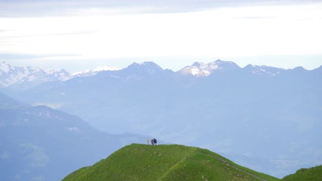 Friends-enjoy-a-beautiful-trek-on-Augstmatthorn-mountain,-Switzerland