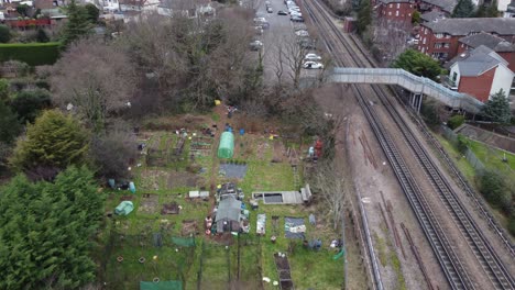 Allotment-by-central-line-railway-Buckhurst-Hill-Essex-UK-aerial-drone-footage