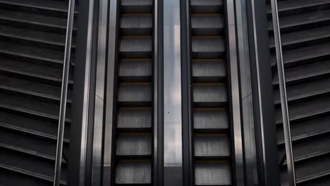 Abstract-scene-with-stairs-and-escalators-moving-in-slow-motion