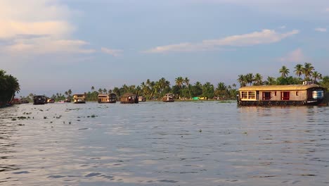 houseboats-running-in-sea-backwater-with-amazing-sky-at-morning-video-taken-at-Alappuzha-or-Alleppey-backwater-kerala-india