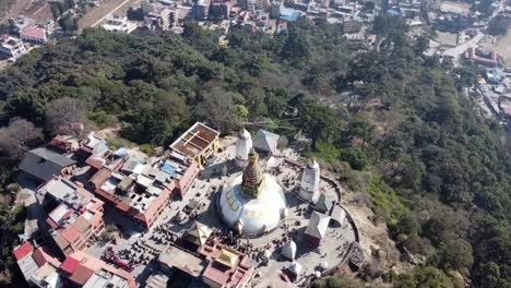 A-view-of-the-Swayambhunath-Stupa-on-the-top-of-a-hill-in-the-city-of-Kathmandu,-Nepal