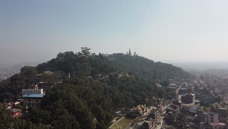 Flying-over-the-populated-city-of-Kathmandu,-Nepal
