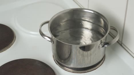 Water-boiling-in-a-kettle-on-a-stove