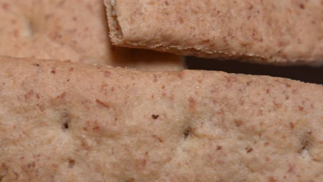 beautiful-macro-close-up-of-graham-crackers-on-a-plate,-slow-slide