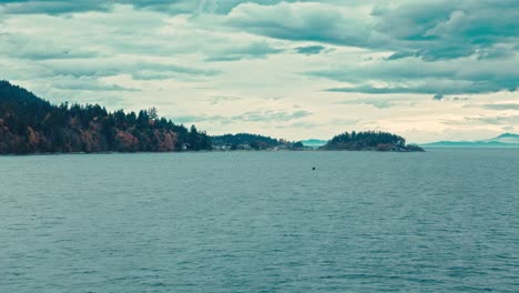 Rocky-island-point-in-wavy-ocean