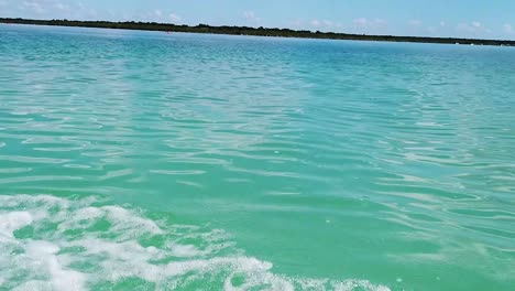 Sailing-on-turquoise-water-in-the-Riviera-Maya,-Quintana-Roo,-Mexico