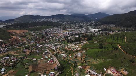 Small-town-Ella-with-many-colored-roofs-between-the-high-mountains-in-the-hilly-landscape-with-many-tea-plantations-of-Nuwara-Eliya-in-Sri-Lanka-on-a-cloudy-day