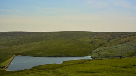 timelapse-of-the-clouds-reflecting-in-the-reservoir-water-,-shot-up-at-saddleworth-moor