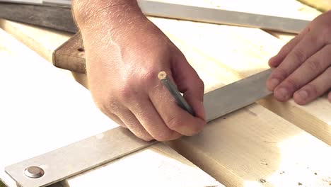 builder-using-a-set-square-on-a-job-stock-video-stock-footage