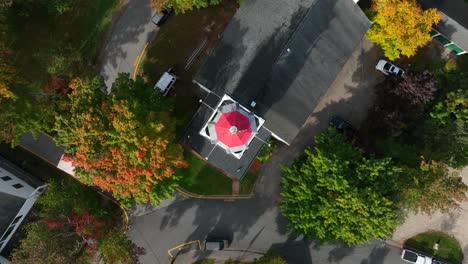 Top-down-of-church-building-in-small-town-USA-during-autumn