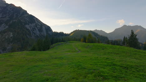 Following-Karwendel-woodland-pathway-aerial-view-overlooking-idyllic-Austrian-Tyrol-mountain-landscape