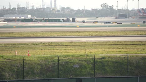 airplane-passes-by-local-runway