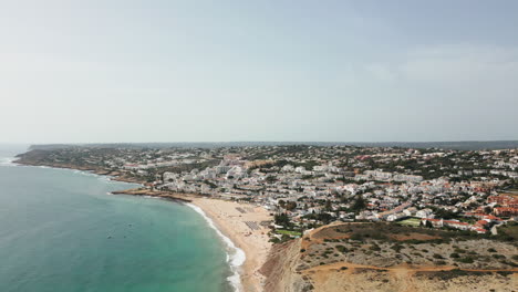 High-drone-shot-over-Luz-Portugal