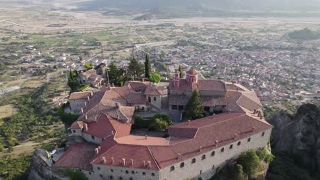 Aerial-forward-view-over-impressive-monastery-in-a-fabulous-position