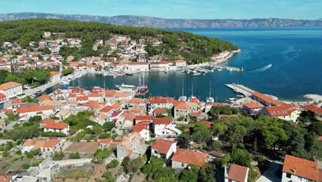 Jelsa-Croatia-town-on-Hvar-panning-drone-aerial-point-of-view-4K