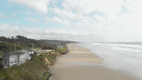 Oregon-Coast-Drone-Sea-Cliff-with-Clouds-Waves-and-road