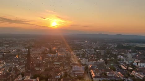Timelapse-of-the-German-city-of-Freiburg-from-beautiful-summer-day-to-busy-night-full-of-city-lights