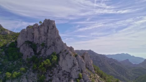 Ascending-aerial-view-of-mountain-crags