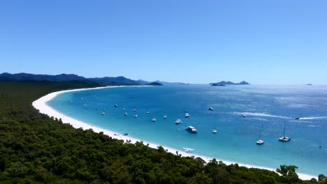 Aerial-footage-of-the-Whitehaven-Beach-in-Queensland,-Australia-on-a-sunny-day