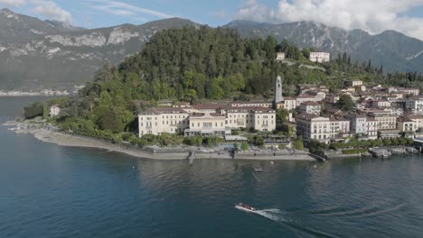 4K-Aerial---Slow-pull-back-from-Hotel-in-Bellagio-Lake-Como,-Italy
