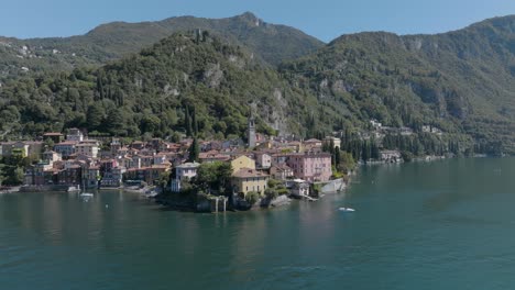4K-Aerial---Slow-orbit-around-Varenna-Headland,-Lake-Como,-Italy