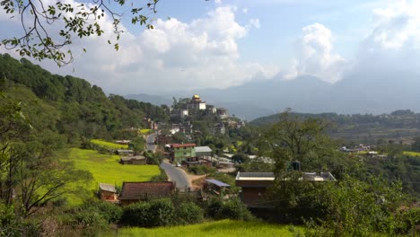 A-view-of-the-Neydo-Tashi-Choling-Monastery-in-the-small-town-of-Dakshinkali-in-Nepal-surrounded-with-mustard-fields