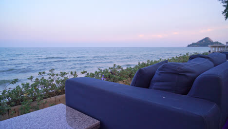 empty-outdoor-sofa-with-sea-beach-view