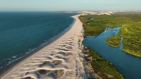 Creeping-sand-dunes-into-wetland-area---Jericoacoara-coastline,-Brazil