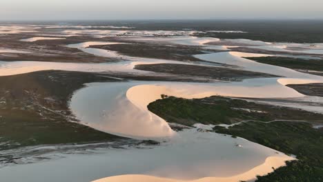 Desertification-by-creeping-sand-dunes-in-coastal-Jericoacoara,-Brazil