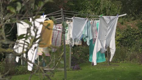 Drying-Clean-Washed-Clothes-Outside-With-Sunlight-And-Wind-Breeze