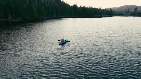 Person-In-Life-Jacket-Canoeing-In-The-River-In-Saint-Come,-Lanaudiere,-Quebec,-Canada