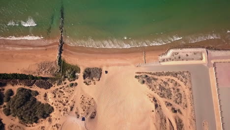 Top-view-of-an-abandoned-beach-waves