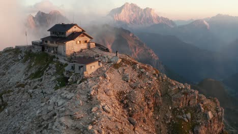 Scenic-setting-of-Nuvolau-mountain-hut-with-view-over-Ampezzo-Valley