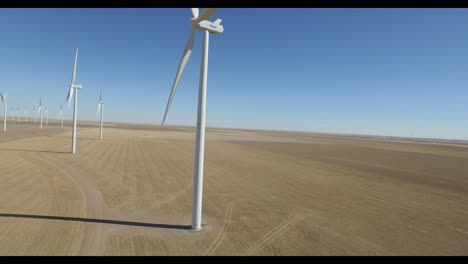 Raising-drone-view-of-wind-turbines-in-Colorado