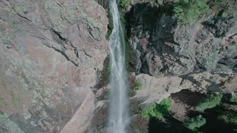 Drone-view-of-a-big-waterfall-in-a-Colorado-mountain