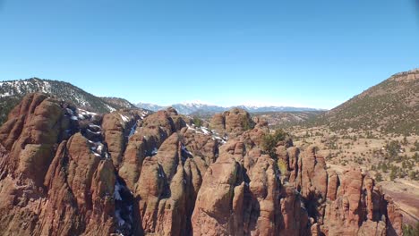 Drone-view-flying-to-spire-rocks-in-Colorado-mountains