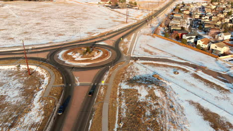 Drone-view-of-a-roundabout-in-a-snowy-Denver