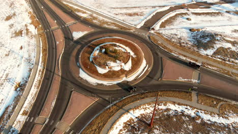 Drone-view-of-a-roundabout-in-a-snowy-Denver